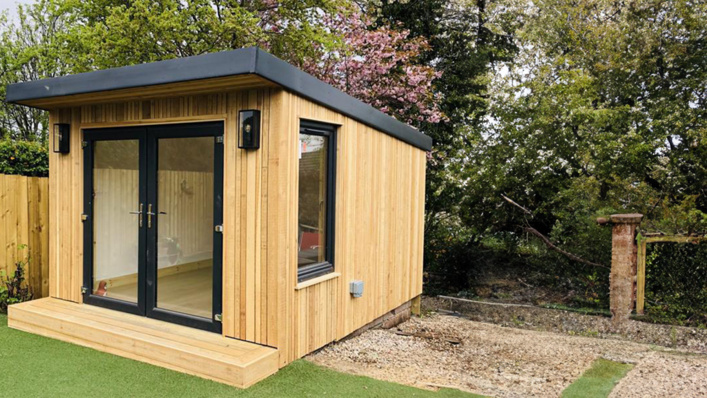 Spacious garden shed with double doors and windows