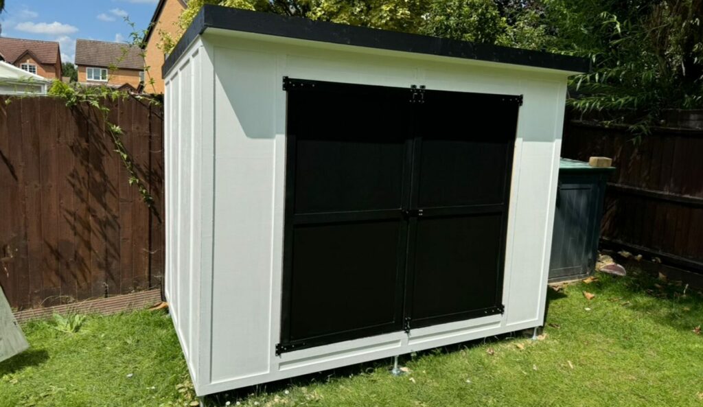 Custom garden shed with built-in planter boxes